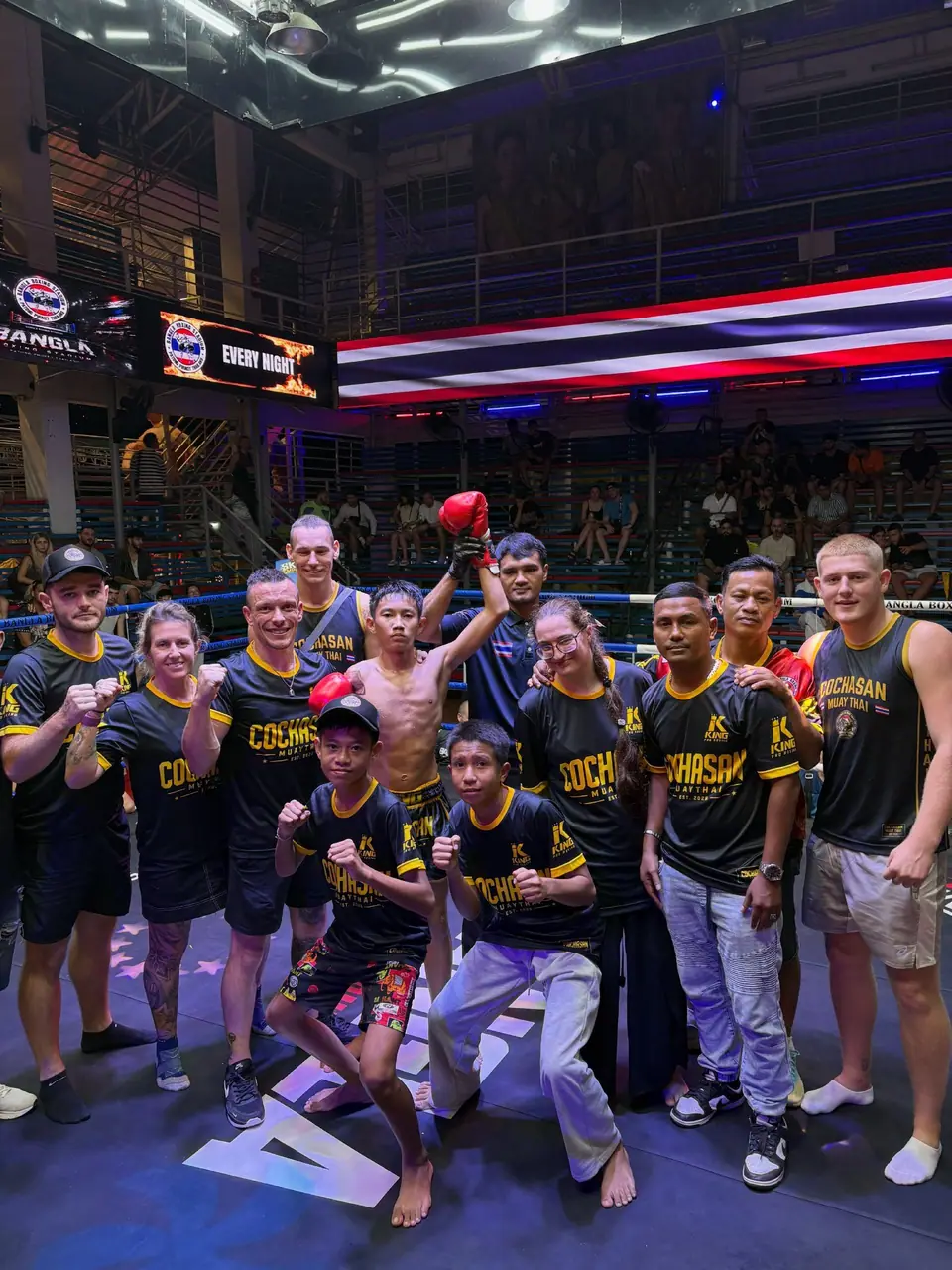 Team COCHASAN in the ring at Bangla Boxing Stadium after a win